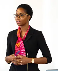 Dr. Victoria Nneji presenting AKALAKA care ecosystem models